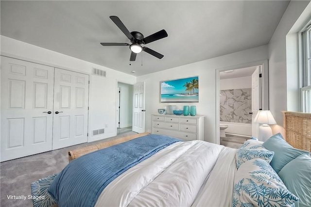 bedroom featuring visible vents, a closet, ensuite bath, and a ceiling fan