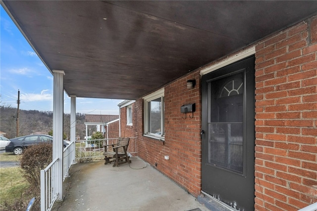 view of patio featuring covered porch