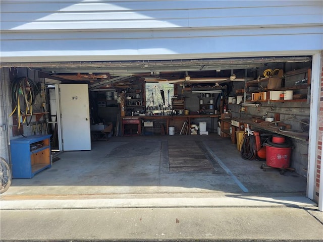 garage with a workshop area