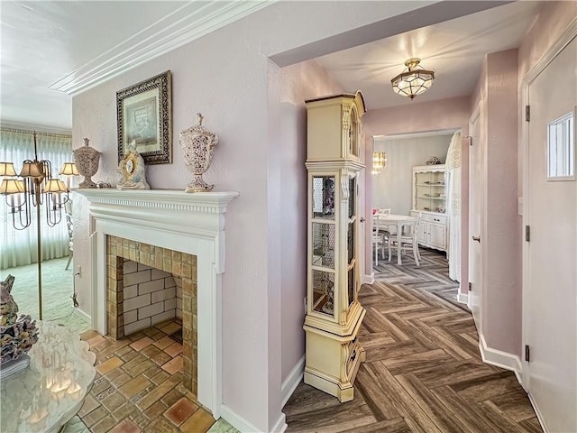 corridor with plenty of natural light, crown molding, and baseboards