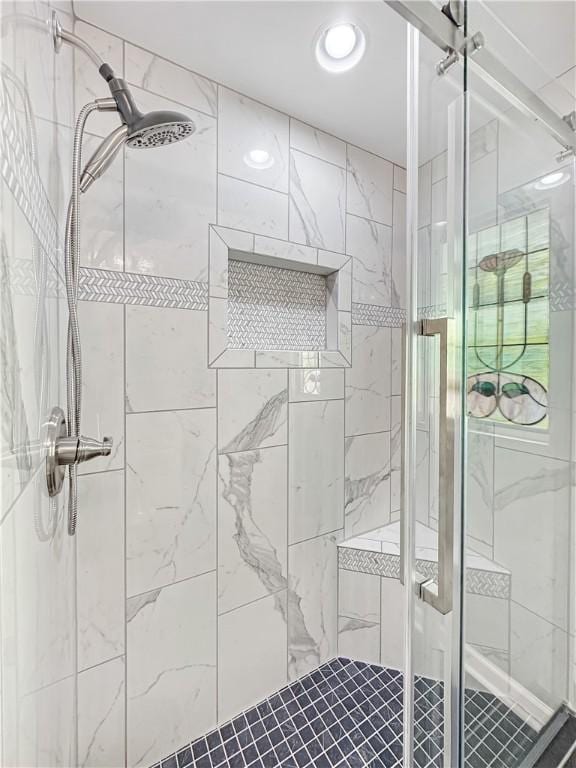 full bath featuring a stall shower