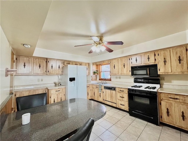 kitchen featuring a sink, dishwasher, white fridge with ice dispenser, black microwave, and range with gas cooktop