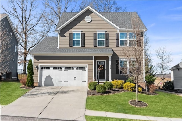 view of front facade featuring a garage, driveway, a front yard, and roof with shingles