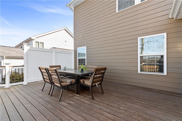 wooden deck with outdoor dining space