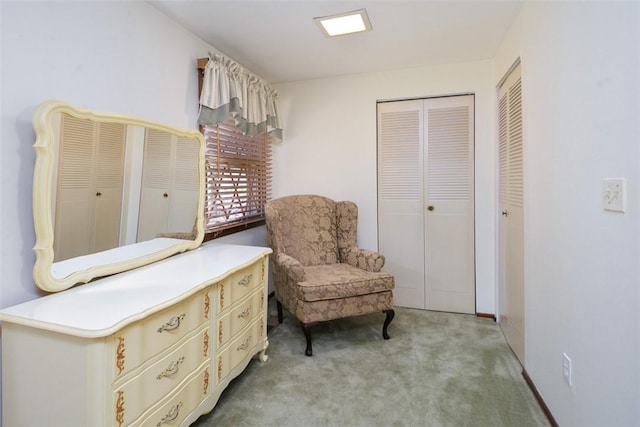 living area with carpet floors