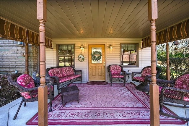 view of patio featuring a porch