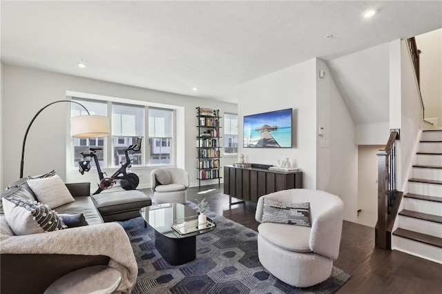 living room with recessed lighting, stairway, and wood finished floors