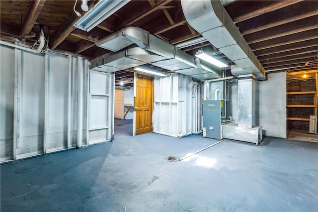 unfinished basement with heating unit