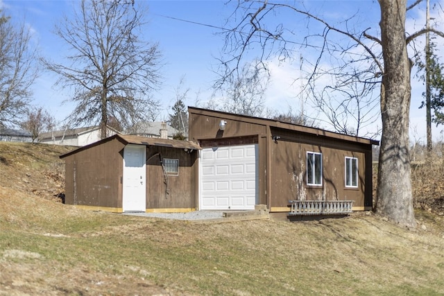 view of outbuilding featuring an outbuilding and a garage