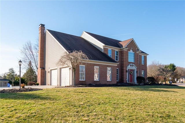 view of front of home featuring brick siding, concrete driveway, a front yard, a chimney, and an attached garage