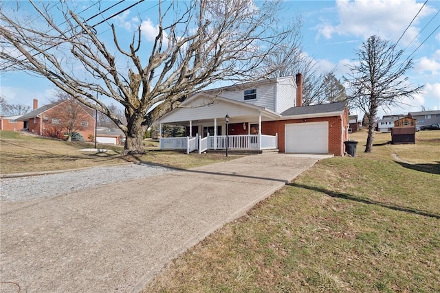 view of front of property with driveway, an attached garage, covered porch, a front lawn, and brick siding