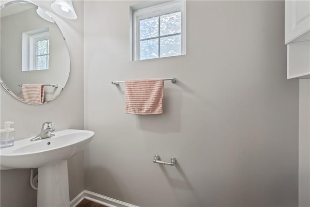 bathroom with baseboards