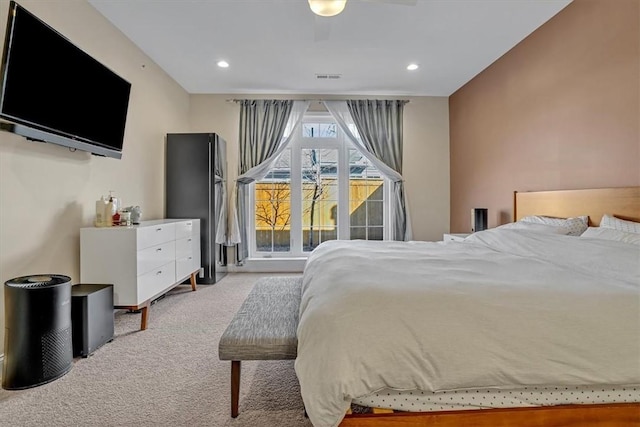 bedroom with recessed lighting, carpet, and visible vents