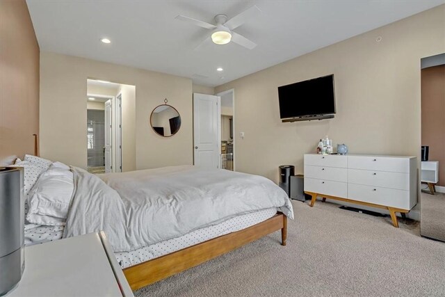 bedroom featuring ensuite bath, carpet flooring, recessed lighting, and ceiling fan