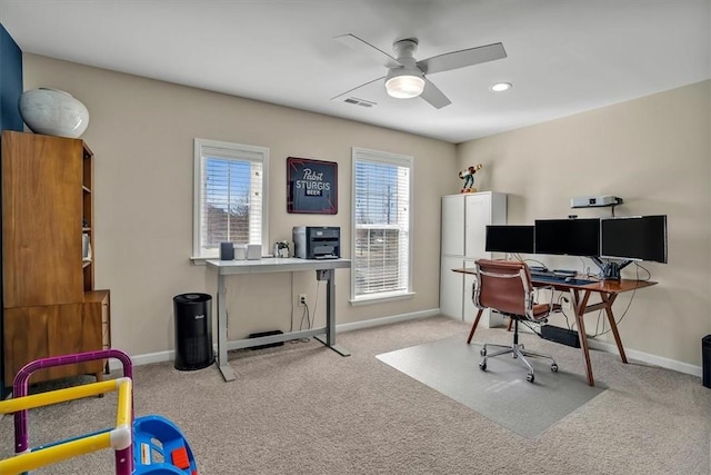 office space featuring baseboards, visible vents, and carpet floors