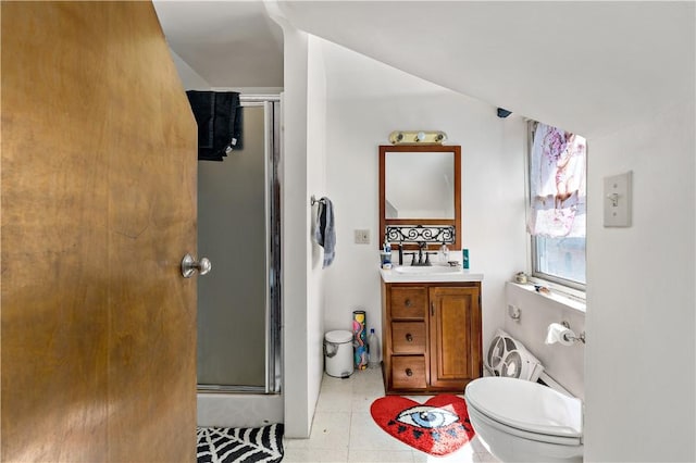 full bathroom featuring vanity, toilet, and a stall shower