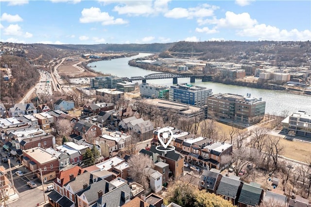 drone / aerial view featuring a water view