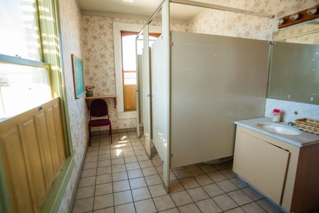 bathroom featuring wallpapered walls, tile patterned floors, and vanity