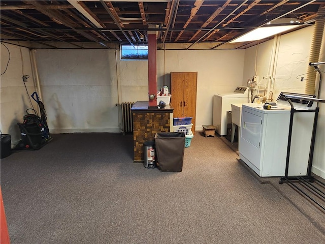 basement featuring washing machine and clothes dryer