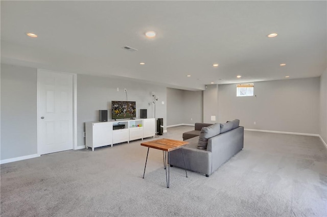 living room featuring light carpet, visible vents, recessed lighting, and baseboards