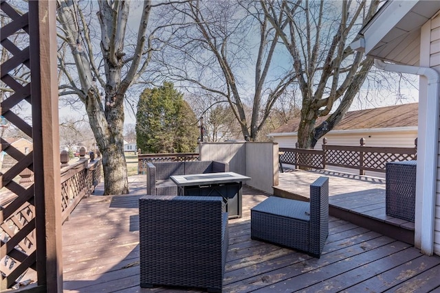 deck featuring outdoor lounge area