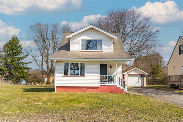 bungalow-style house with driveway, covered porch, an outdoor structure, a front lawn, and a garage