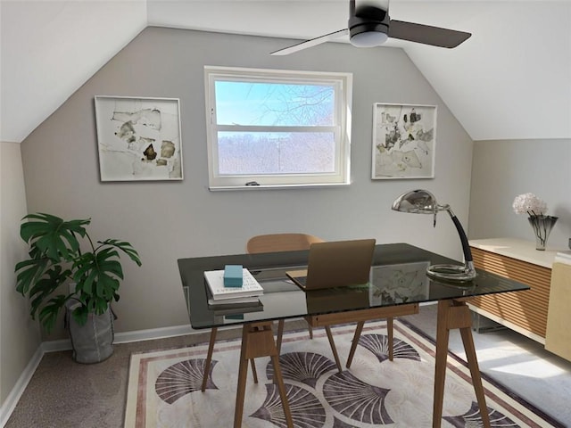 office featuring ceiling fan, baseboards, and vaulted ceiling