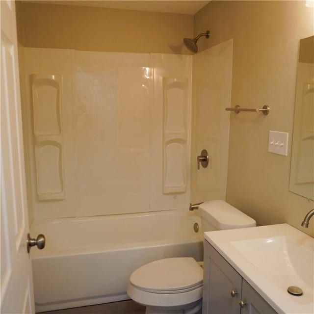 full bath with vanity, toilet, and shower / washtub combination