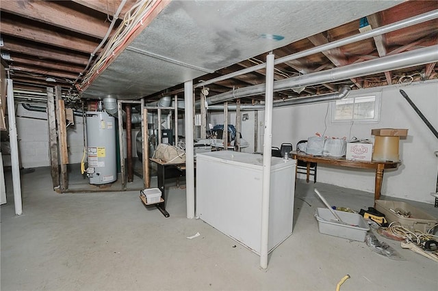 below grade area with water heater and refrigerator