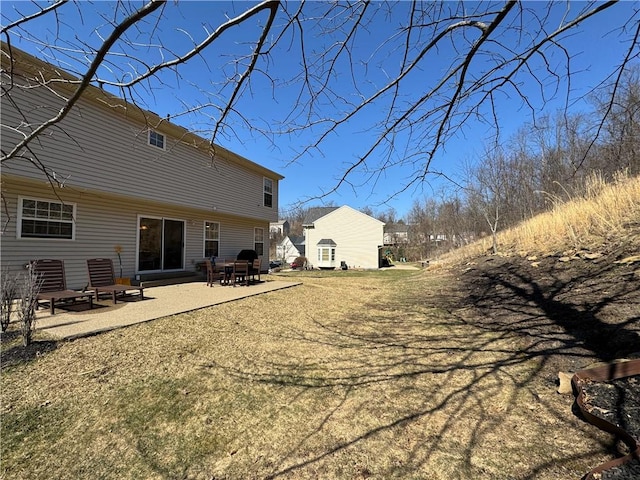 rear view of house featuring a patio area