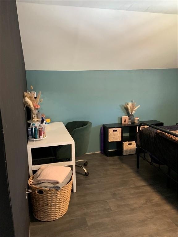 bedroom with wood finished floors