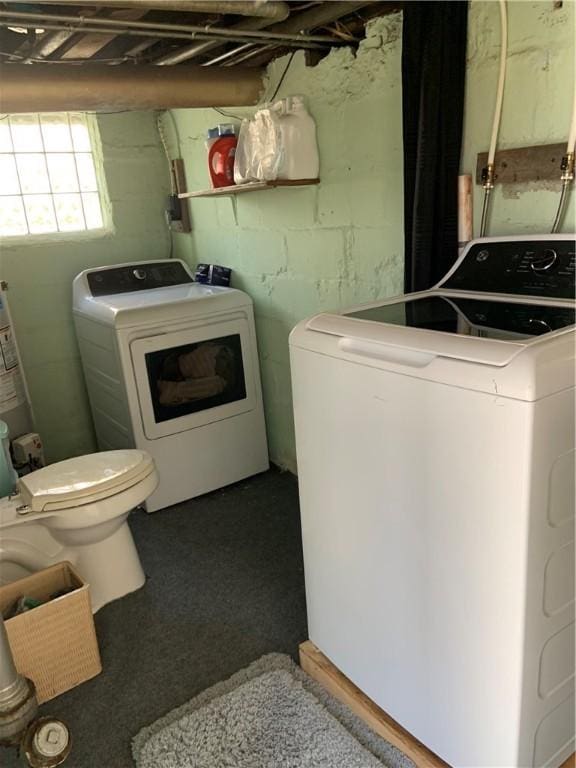 laundry room featuring laundry area and washer and clothes dryer