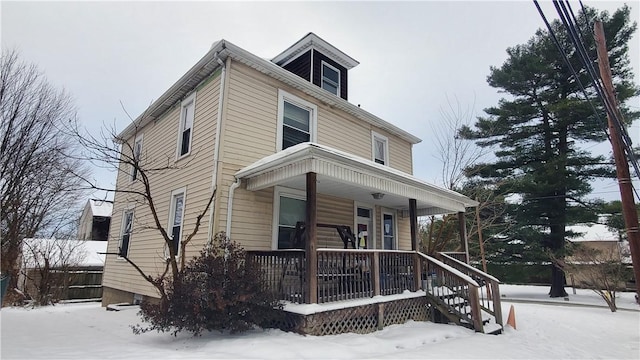 traditional style home featuring a porch