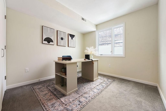 office featuring visible vents, baseboards, and carpet floors