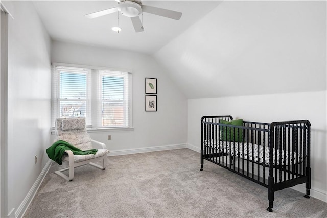 bedroom featuring baseboards, a ceiling fan, lofted ceiling, and carpet floors