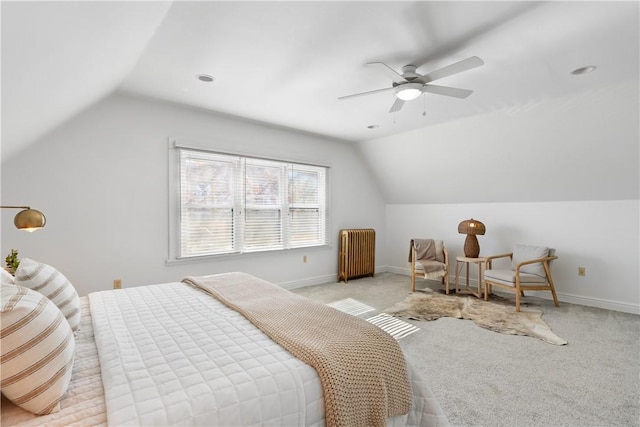 bedroom with baseboards, light carpet, lofted ceiling, and radiator heating unit