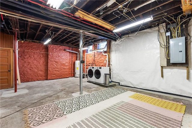 basement with washer and dryer, electric panel, and water heater