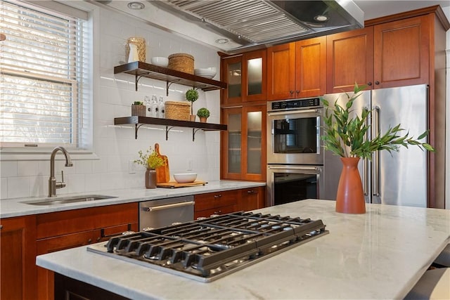 kitchen featuring open shelves, plenty of natural light, appliances with stainless steel finishes, and a sink