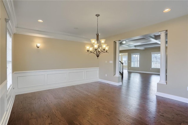 unfurnished dining area with beamed ceiling, coffered ceiling, dark wood-style floors, recessed lighting, and decorative columns