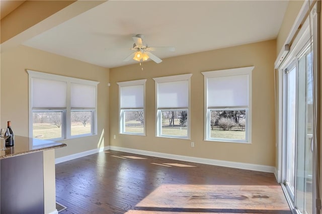 interior space featuring a ceiling fan