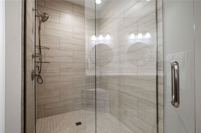 bathroom with a shower stall