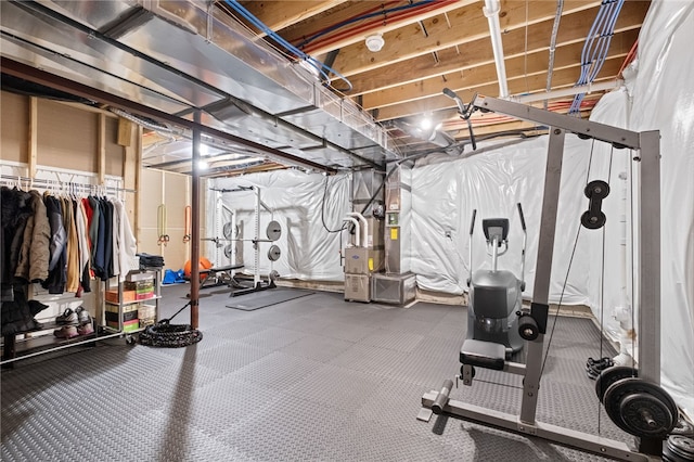 exercise room featuring heating unit