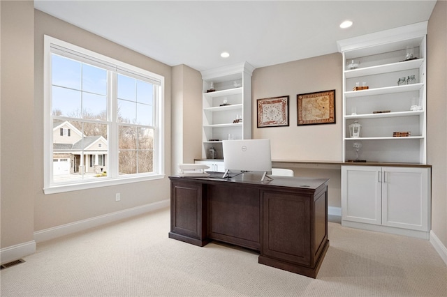 office space featuring light carpet, visible vents, recessed lighting, and baseboards