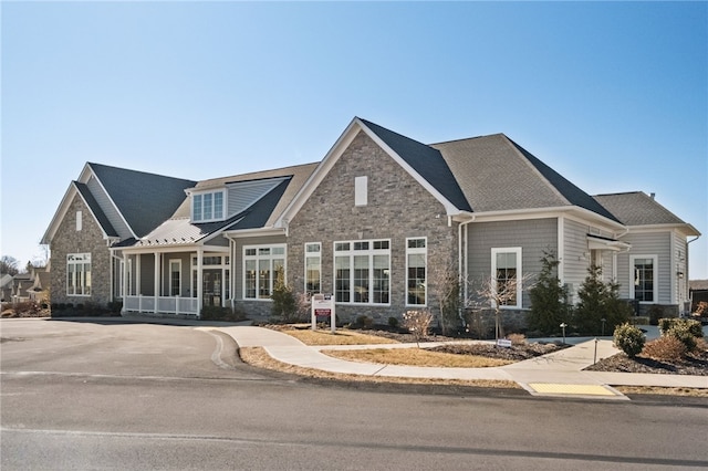 view of front of house featuring stone siding