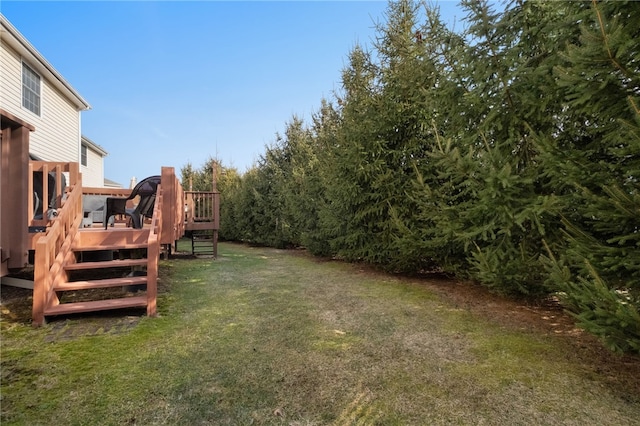 view of yard featuring a deck