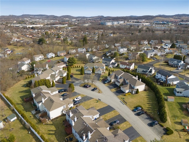 birds eye view of property featuring a mountain view and a residential view