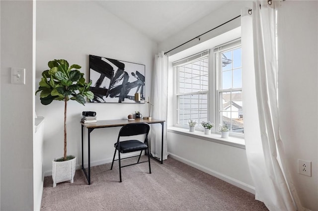 home office with vaulted ceiling, baseboards, and carpet floors