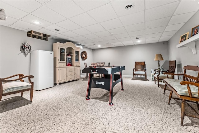 game room featuring a drop ceiling, visible vents, baseboards, and recessed lighting