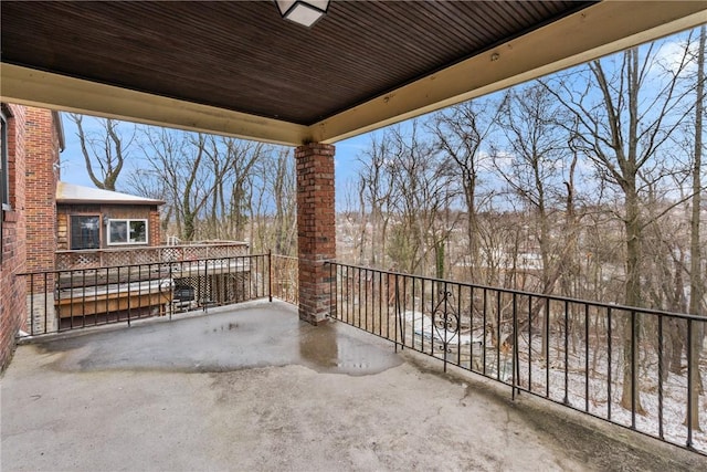 view of patio with a balcony