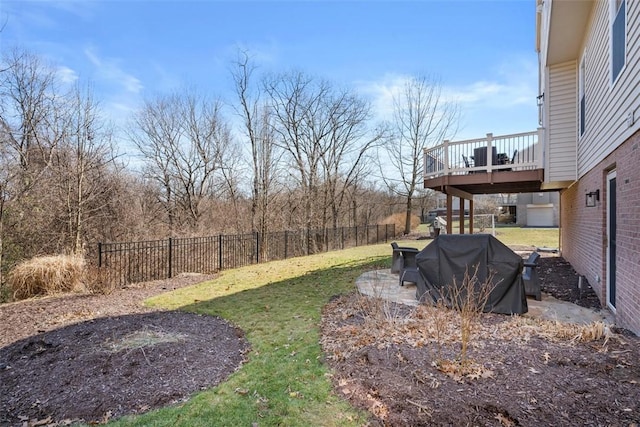 view of yard with fence private yard and a wooden deck